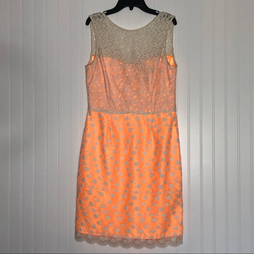 Ivory Lace overlay over a coral color liner dress. Item# 0082
